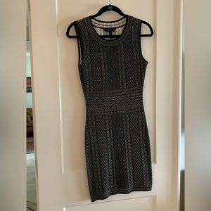 Classic, gorgeous figure flattering “bandage” material dress.